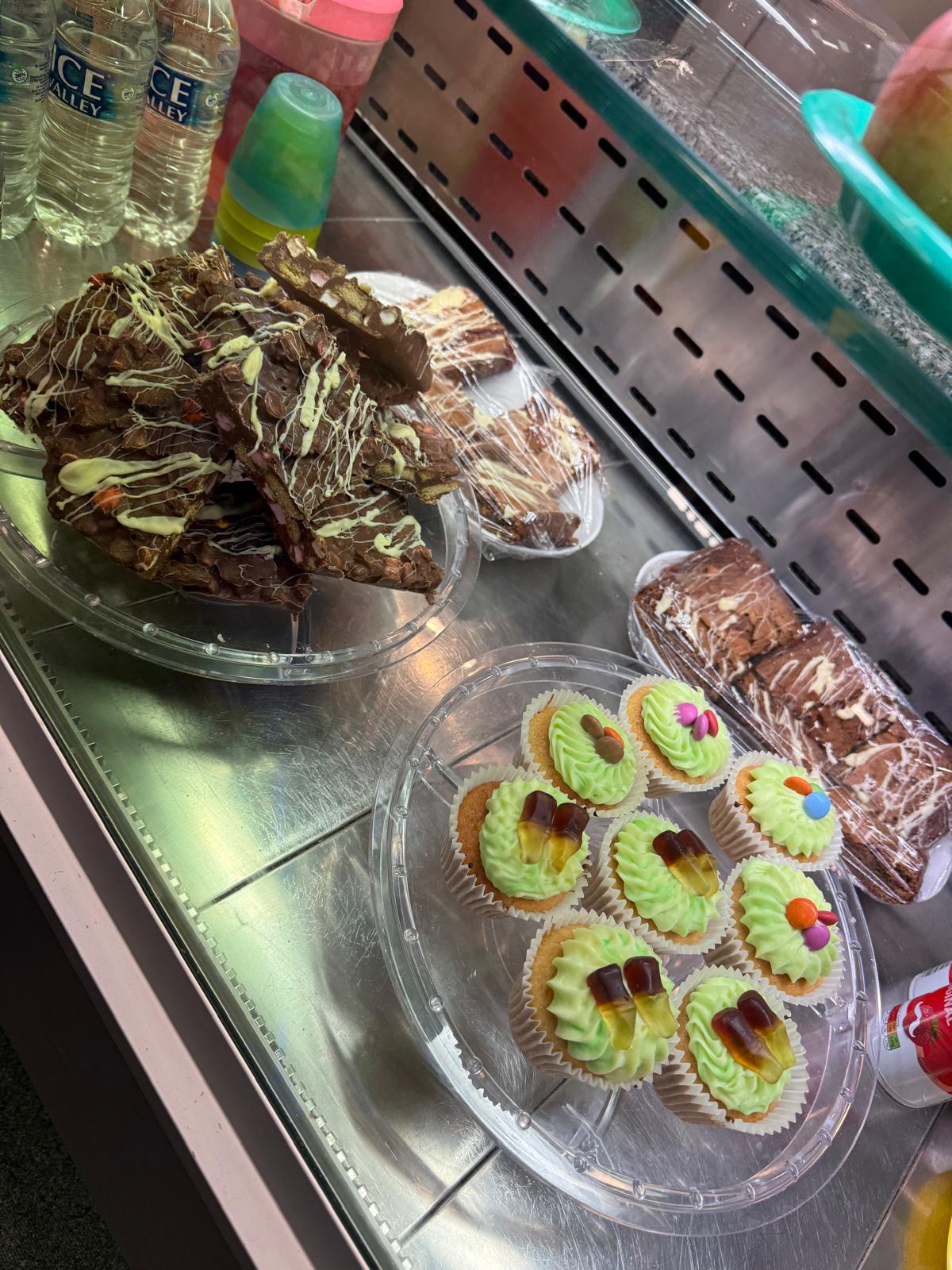Treats and cupcakes in the cafe display